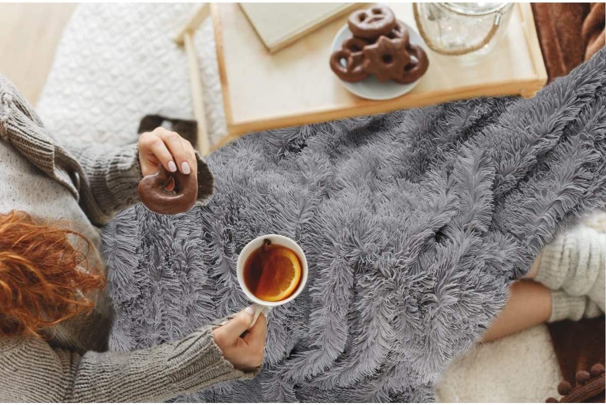 Thickened Fluffy Blanket Warm winter Bedspread on the bed