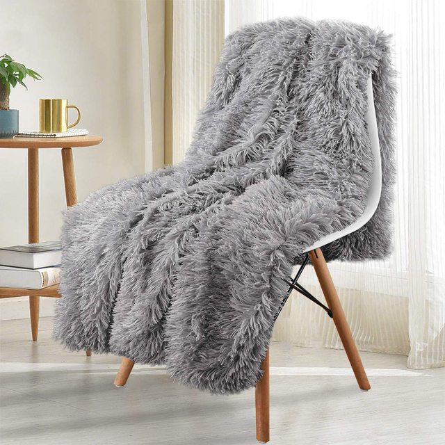 Thickened Fluffy Blanket Warm winter Bedspread on the bed